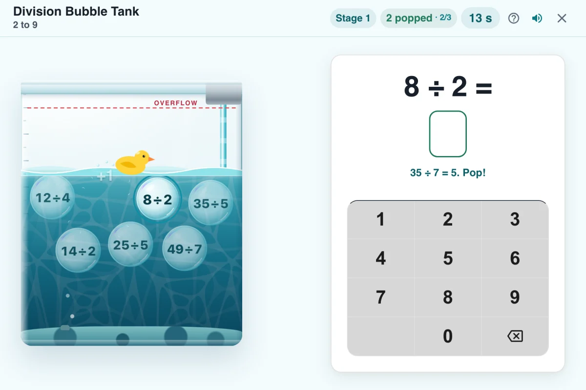 A round of Division Bubble Tank in progress, showing bubbles with division facts floating above rising water in a glass tank